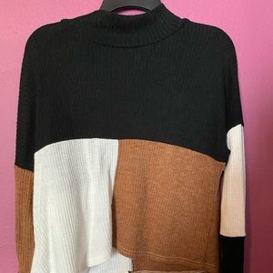 A turtle neck long sleeve shirt